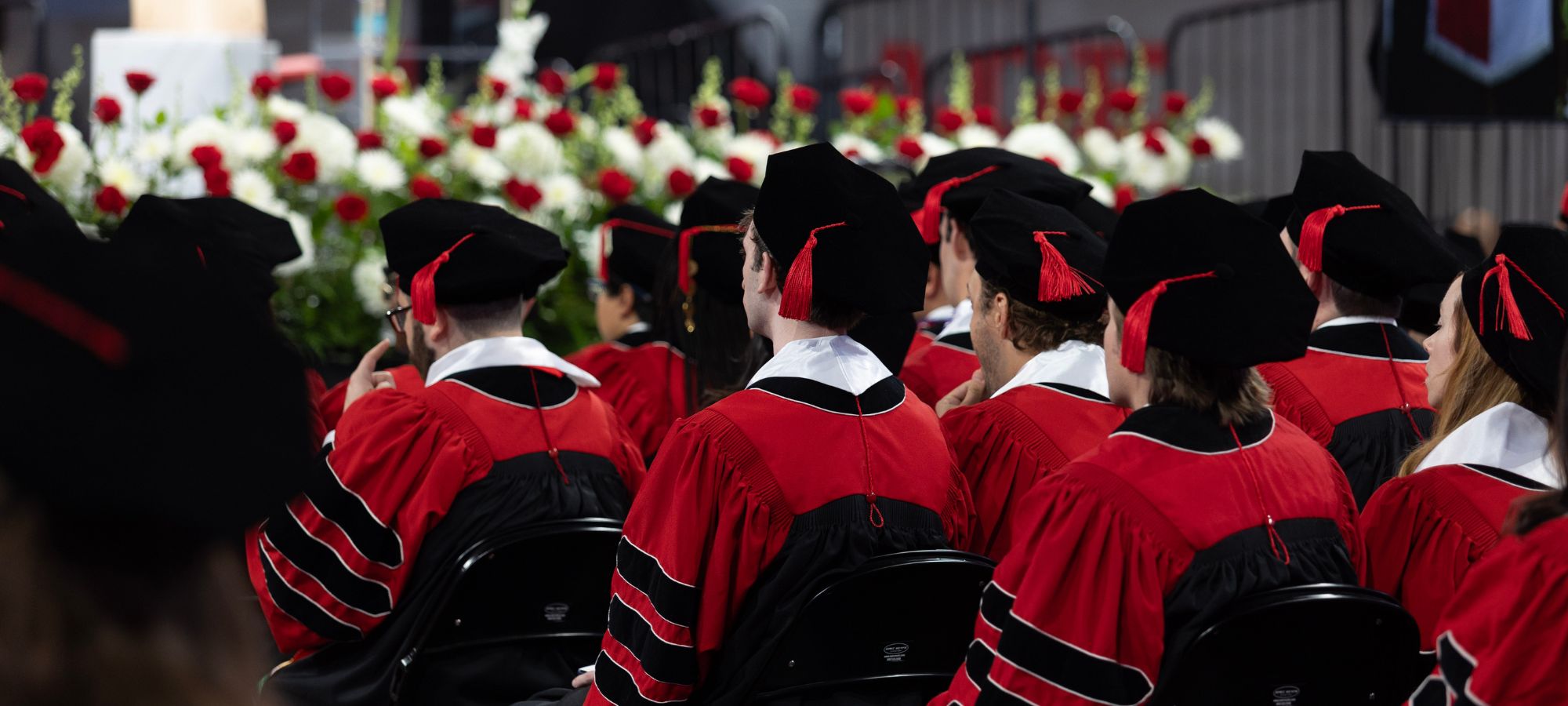 University of Houston Law Center graduates seated during the 2026 commencement ceremony at the Fertitta Center.