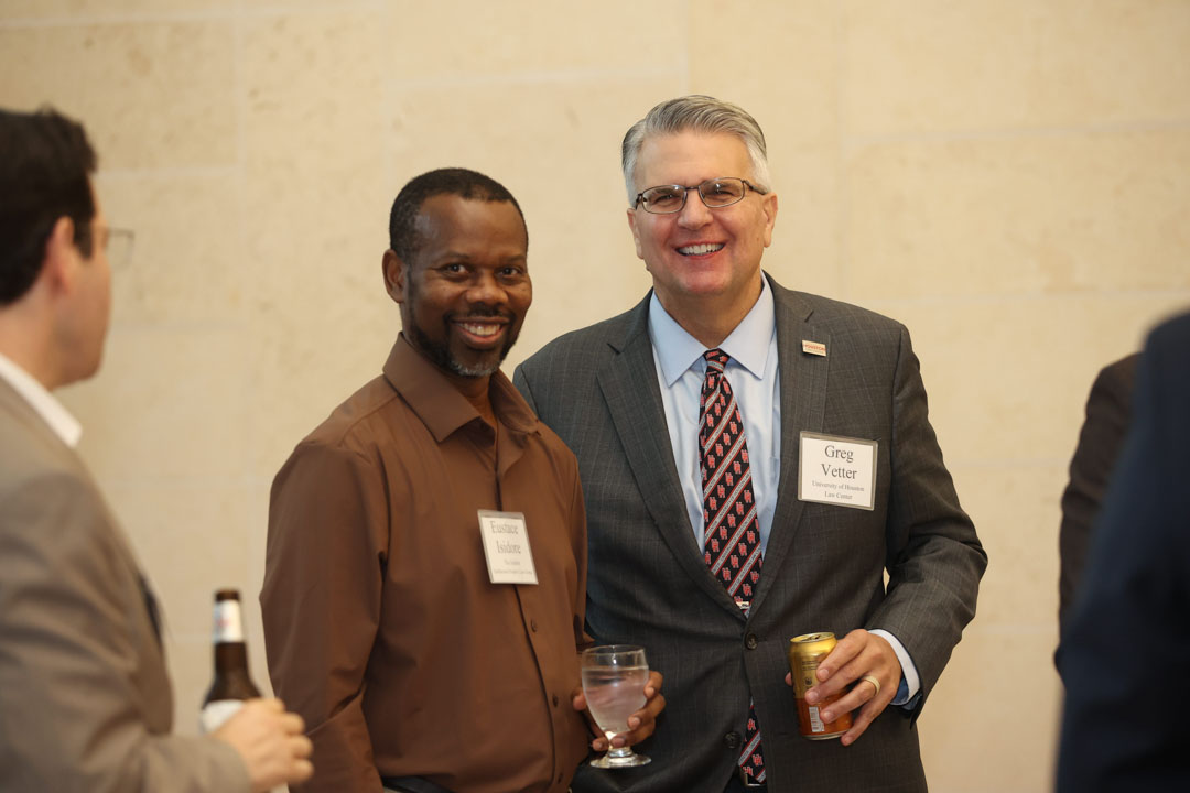 Eustace Isidore and Greg R. Vetter at the IPIL Advisory Council Dinner reception