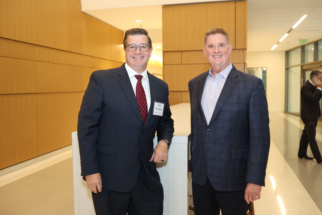 Jason Saunders and Michael Collins at the IPIL Advisory Council Dinner reception