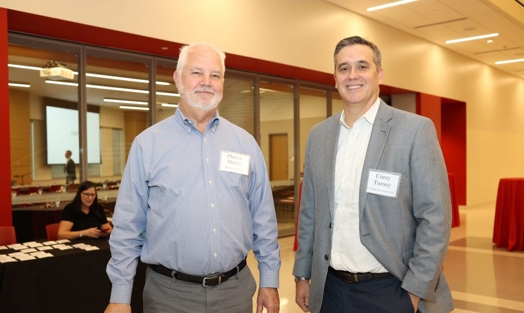 Phillip Shotts and Corey Tumey at the IPIL Advisory Council Dinner reception