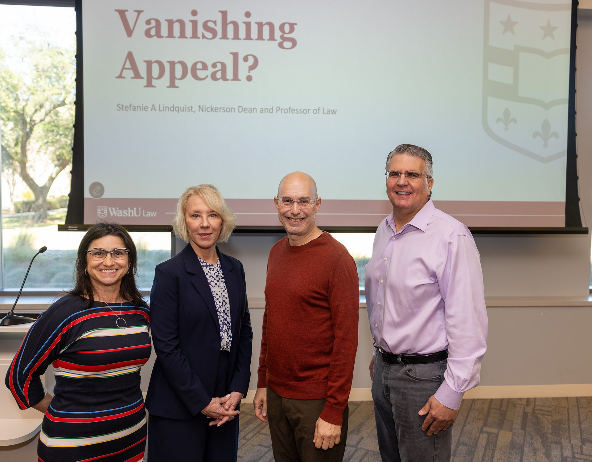 UHLC Professor Emily Berman, WashU Law Dean Stefanie A. Lindquist, UHLC Professor Lonny Hoffman and UH Law's associate dean of academic affairs pose before Lindquist’s presentation 'The Vanishing Appeal?' at the University of Houston Law Center.