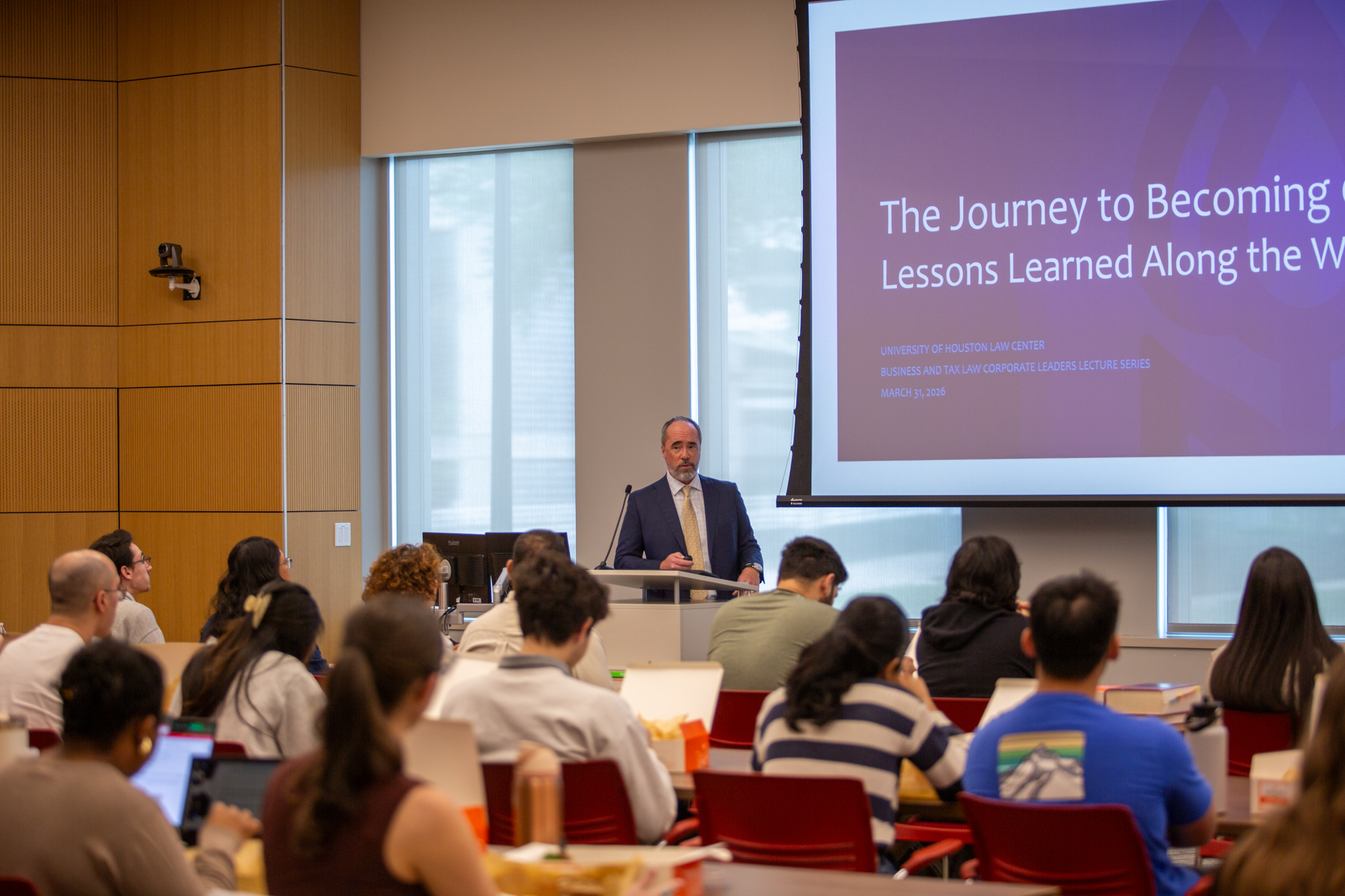 From L to Right: UHLC Professor Denny Wright, UH Law Dean Leonard M. Baynes and alumnus Lance Lightfoot (JD '99) with UH Law students in the John M. O'Quinn Law Building