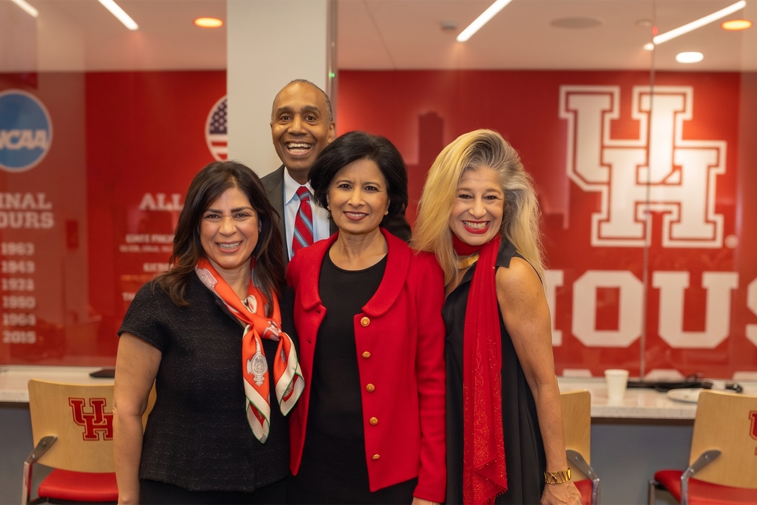 Justice Rebeca Aizpuru Huddle, Dean Baynes, President Khator and Judge Sofia Adrogué (J.D.'91) of Texas Business Court, Eleventh Division