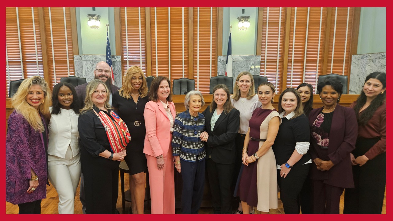 Justice Ruby Kless Sondock attends an awards event with UH Law Dean Leonard M. Baynes and other guests.